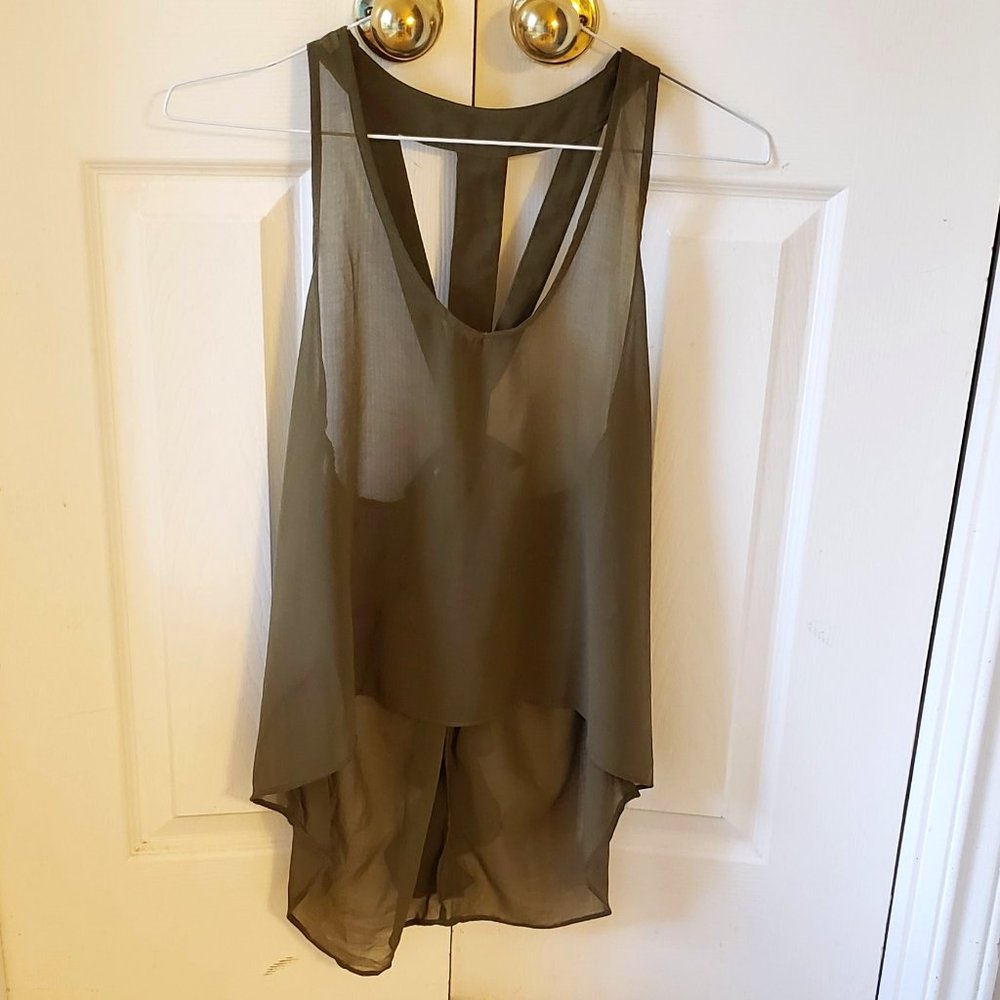 Forever XXI Beautiful very fresh silk blouse with a detail of a hem and bow.